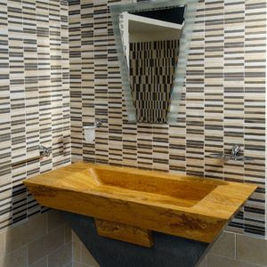yellow palmas stone bathroom