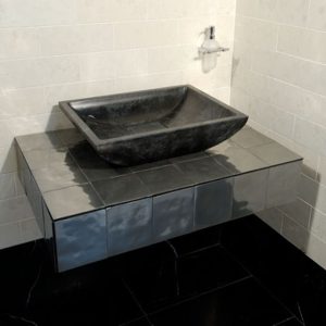 black marquinia marble bathroom