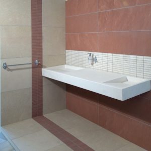 bathroom made in red tibetan marble and zen stone sink