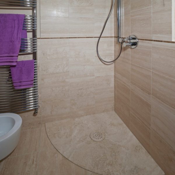 dark travertine bathroom