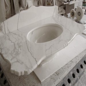 bathroom sink in white calacatta marble
