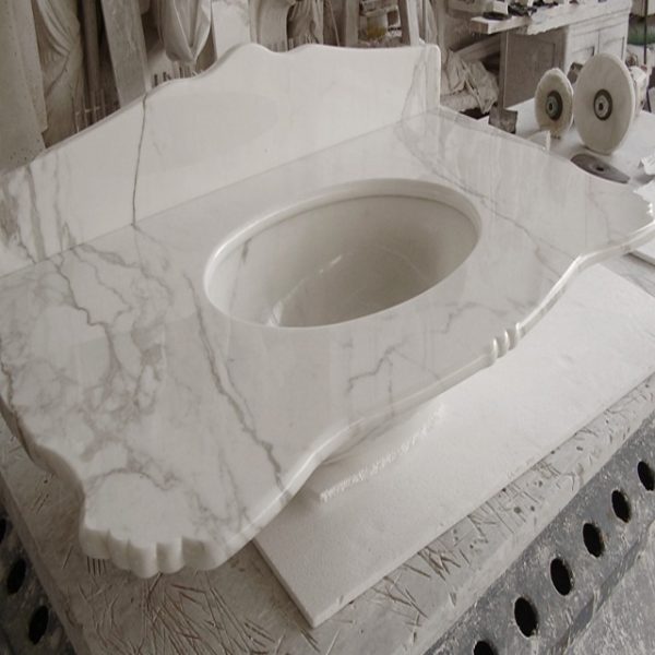 bathroom sink in white calacatta marble